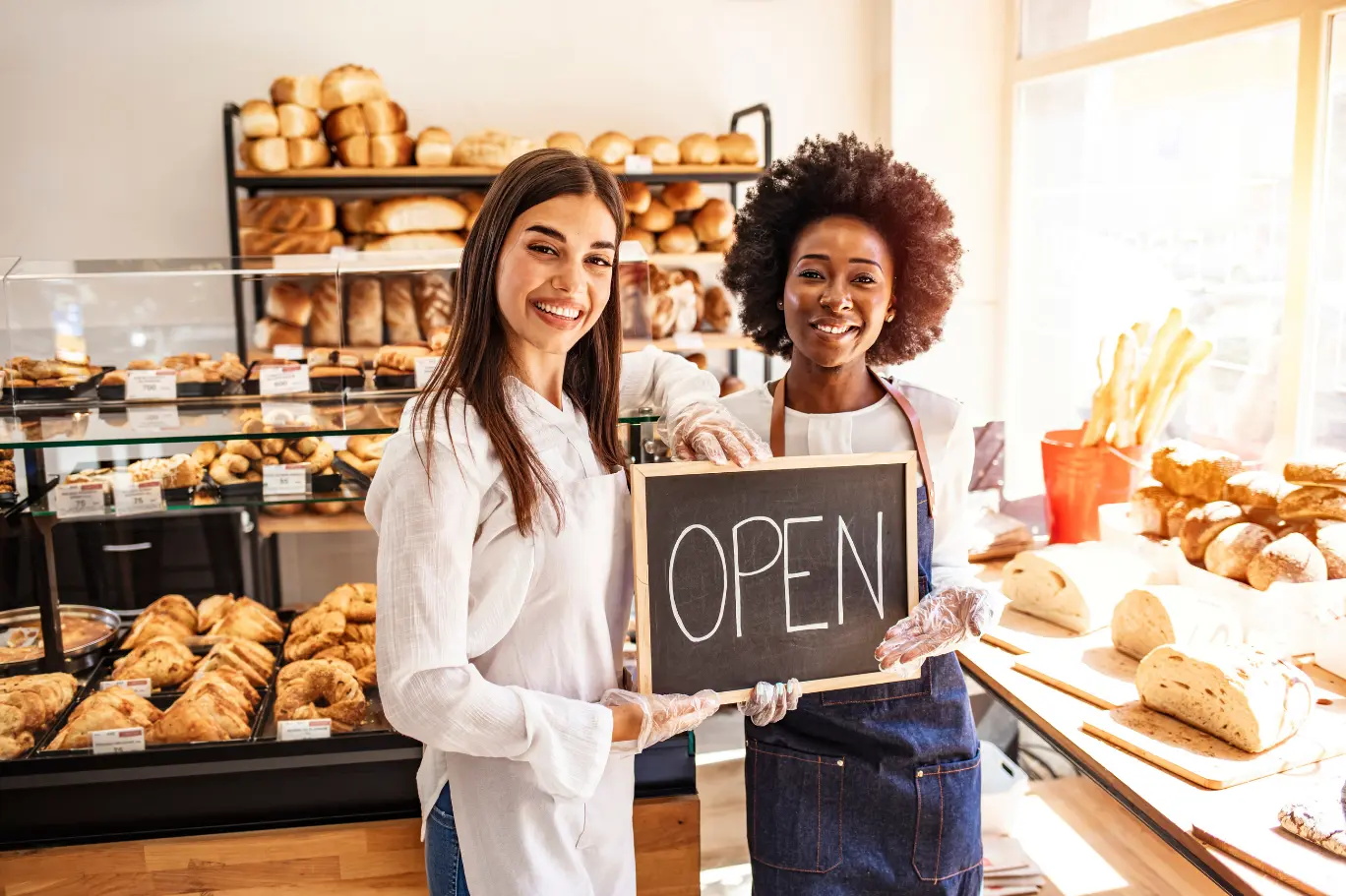 Two Australian small business owners opening their bakery for trade, supported by KSH TAX for Xero bookkeeping, BAS lodgement and Single Touch Payroll